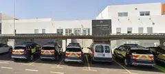 Imagen de la entrada en el recinto de la Autoridad Portuaria en Arrecife con los coches de su Polic&iacute;a Portuaria.