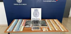 Dinero y droga incautada por la Polic&iacute;a Nacional.