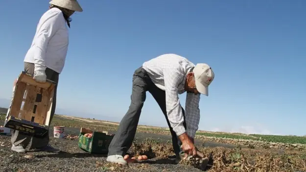 Imagen de archivo de los agricultores de los valle.