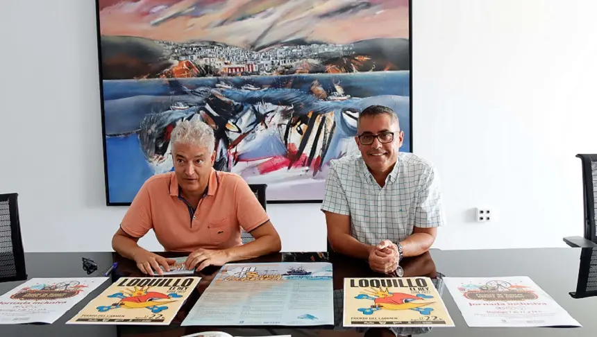 José Juan Cruz y Sergio García durante la presentación del cartel de las fiestas del Carmen.