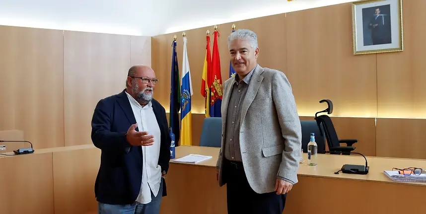 José Juan Cruz junto a Nicolás Saavedra.