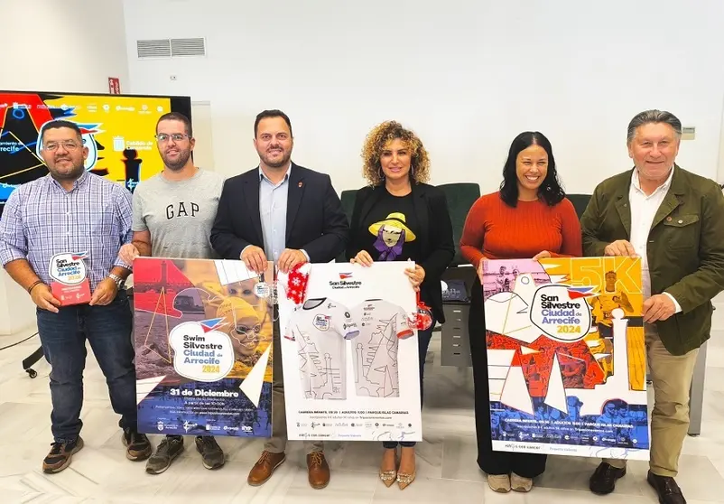 Kevin Cortes, Yonathan de León, Eli Merino y Roberto Hervón en la presentación de la San Silvestre y la Swim Silvestre.