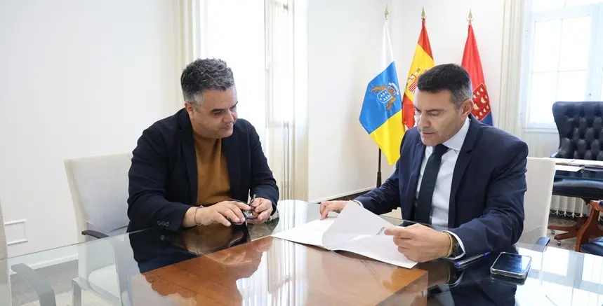 Oswaldo Betancort y Armando Santana.