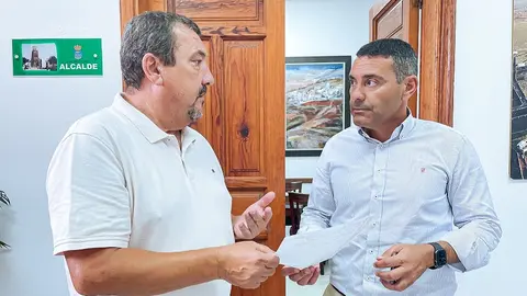 Oswaldo Betancort junto a Miguel Ángel Jiménez .