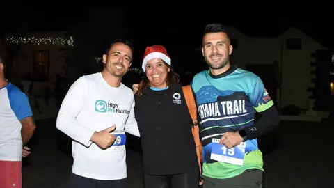 Olivia Duque con dos de los participantes