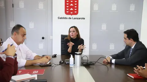 María Dolores Corujo junto a Andrés Stinga y José Valles.