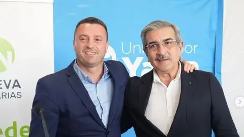 Óscar Noda y Román Rodríguez en un acto político.