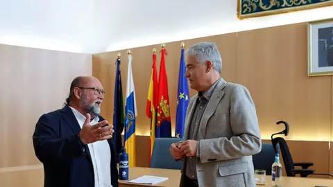 José Juan Cruz junto a Nicolás Saavedra.