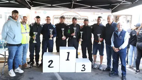 Los ganadores de la prueba junto a autoridades y personalidades como el alcalde de Tías