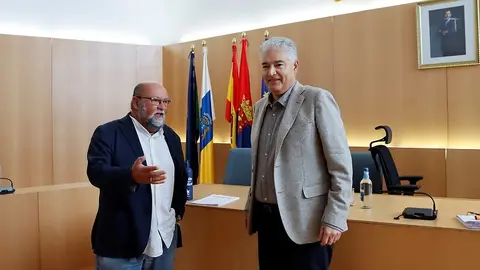 José Juan Cruz junto a Nicolás Saavedra.