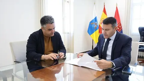 Oswaldo Betancort y Armando Santana.