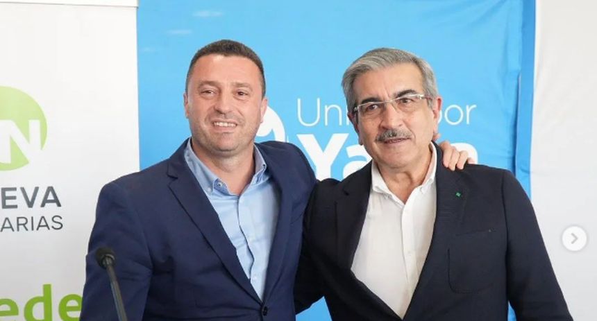 Óscar Noda y Román Rodríguez en un acto político.